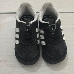 Adidas Black and White Sneakers with Iconic Stripes